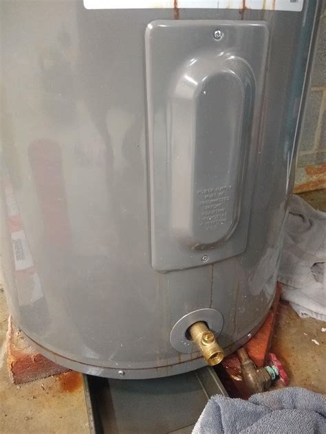 Water Heater Leaking from Panel: Quick Fixes & Tips